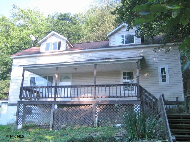Claysburg home private yard. Needs TLC and being sold AS-IS. Features large living room, eat-in kitchen and semi-finished basement. Vinyl siding, insulated glass windows, large front deck and private rear yard. Property sold as-is. Seller will make no repairs. Offers must be submitted through HUD approved broker. Buyer pays both transfer taxes. Marketed by MMREM.com. More properties at www.HUDhomestore.com.