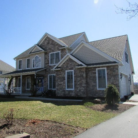 Beautiful home of cherry wood, columns, rounded windows, ceramic tile, hardwood floors, granite c-tops, stippled & swirled 9' ceilings w/lots of recessed lighting.  Foyer has great first impression w/columns, rounded archways, open two stories, large rounded window at second story. FR has gas fireplace. Kitchen is cherry wood with 12x10 eat-in area at 11' bay window with window seat. Guest BR on 1st floor w/separate access to bath.  Master Bedroom is huge w/angled ceiling up to 11' plus Master Bath & 10x7.5 WIC w/organizers. Three more bedrooms upstairs w/full bath & laundry room w/skylight. Lower level has split staircase, kitchen/wet bar, bath, rec room. 30x7 front porch. 24x11 covered deck. Central vac. 3-zone heating. Creative landscaping! Great neighborhood!  5 minutes to shopping!