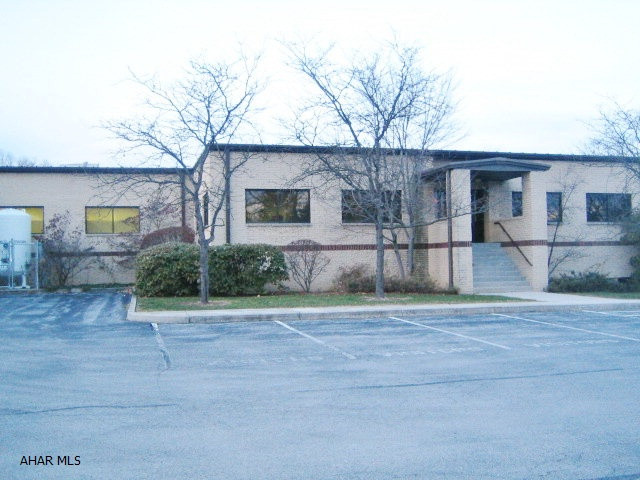 HOLLIDAYSBURG INDUSTRIAL AND WAREHOUSE FACILITY – Features  21,030 sq ft manufacturing building on 4.9 acre lot and 8,440 warehouse building on 5.3 acre lot. Extremely well maintained with good parking, overhead doors, loading dock and convenient location. Properties deeded separately, but being sold together. Property sold AS-IS. Seller will make no repairs.