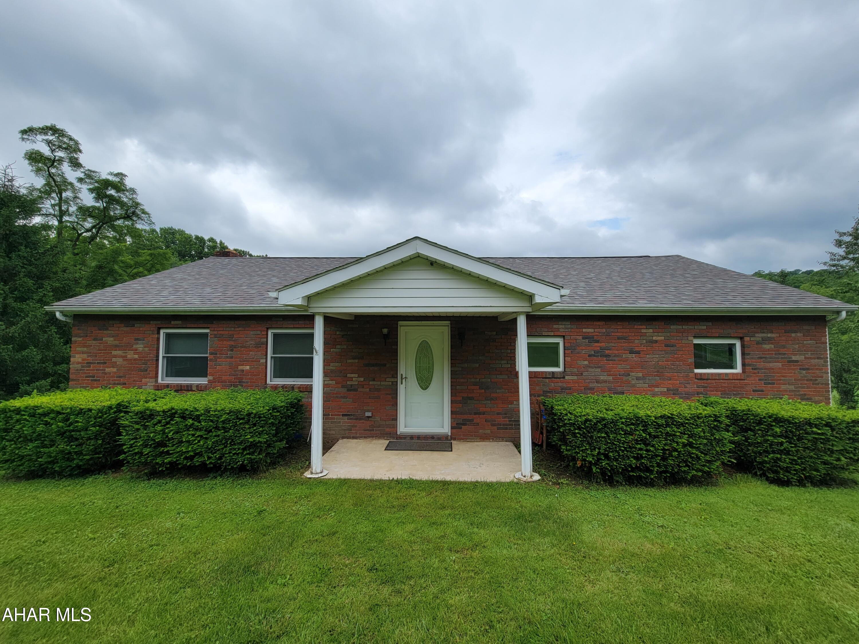 This meticulously kept 3 bedroom 1.5 bath BRICK RANCH  features approximately 1.56 acres which is a unique attribute for city living.  Enjoy the spectacular views & wildlife from the spacious deck off the kitchen that overlooks the large private backyard. Solid steel beams span the length of the house. In addition, there is plenty of storage space as the attic is the full length of the home. The roof and furnace are both less than five years old. Besides the one car Integral garage, there is plenty of parking.  It sits far off the road in a private peaceful setting. (Preapproved buyers only, buyers to confirm taxes, sq footage, and lot size).