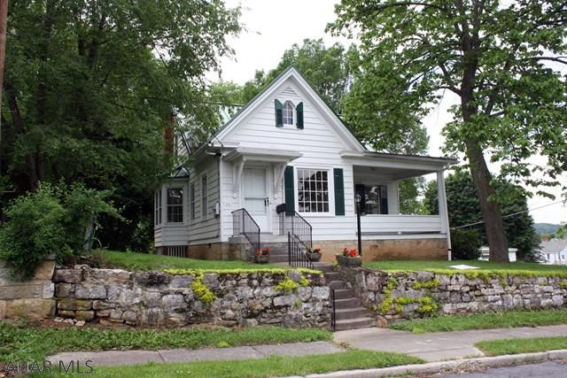 This home has been pristinely maintained and well care for!! Located in Historic Bedford Borough just seconds away from shops and restaurants.  The first level offers a living room with oak floors, kitchen with eat-in area, dining room with oak floors, two bedrooms with pine board floors and a full bath.  Second level has two bedrooms with pine floors and a half bath.  Full unfinished basement, gas hot water furnace, central air conditioning and 200-amp electric.  Cozy covered porch, hand cut stone retaining wall and off-street parking.