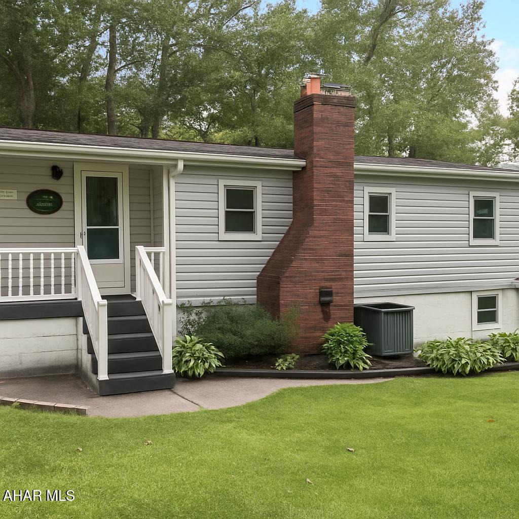 This house is just perfect! First, the yard is quiet and serene, feeling like you are part of nature by just relaxing on the covered deck. Then , as soon as you walk in with the custom built in window seat that boasts built ins on both sides. The flooring throughout the first floor is Pergo luxury waterproof laminate. The kitchen is custom designed by Fine line cabinets with Hickory cabinets and beautiful granite counters. 
There are 3 large bedrooms on the first level along with a new custom designed bathroom. 
The finished lower level has a family room with a Pellet stove that sits on a beautiful brick hearth. The 4th bedroom is just down the hall from the laundry room and bathroom. 
This home features all new top of the line Anderson Windows that will keep the heat out in the summer and the cold out in the winter.  Call today for your private showing and  lets make this loved and cared for home yours!