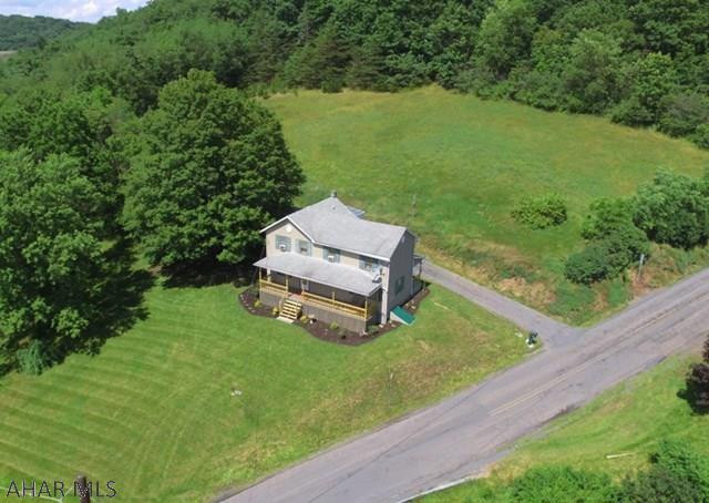 Country living at it's finest yet close to town. 2 story home on 4.445 acres. 3 bedroom, 1 bath with new flooring throughout. Gorgeous Hickory hardwoods on first floor and wormy red oak hardwoods in all 3 bedrooms. A must see. Updated electric, updated bathroom and new spacious front porch that is so inviting. Sit back and enjoy the peace and quiet!