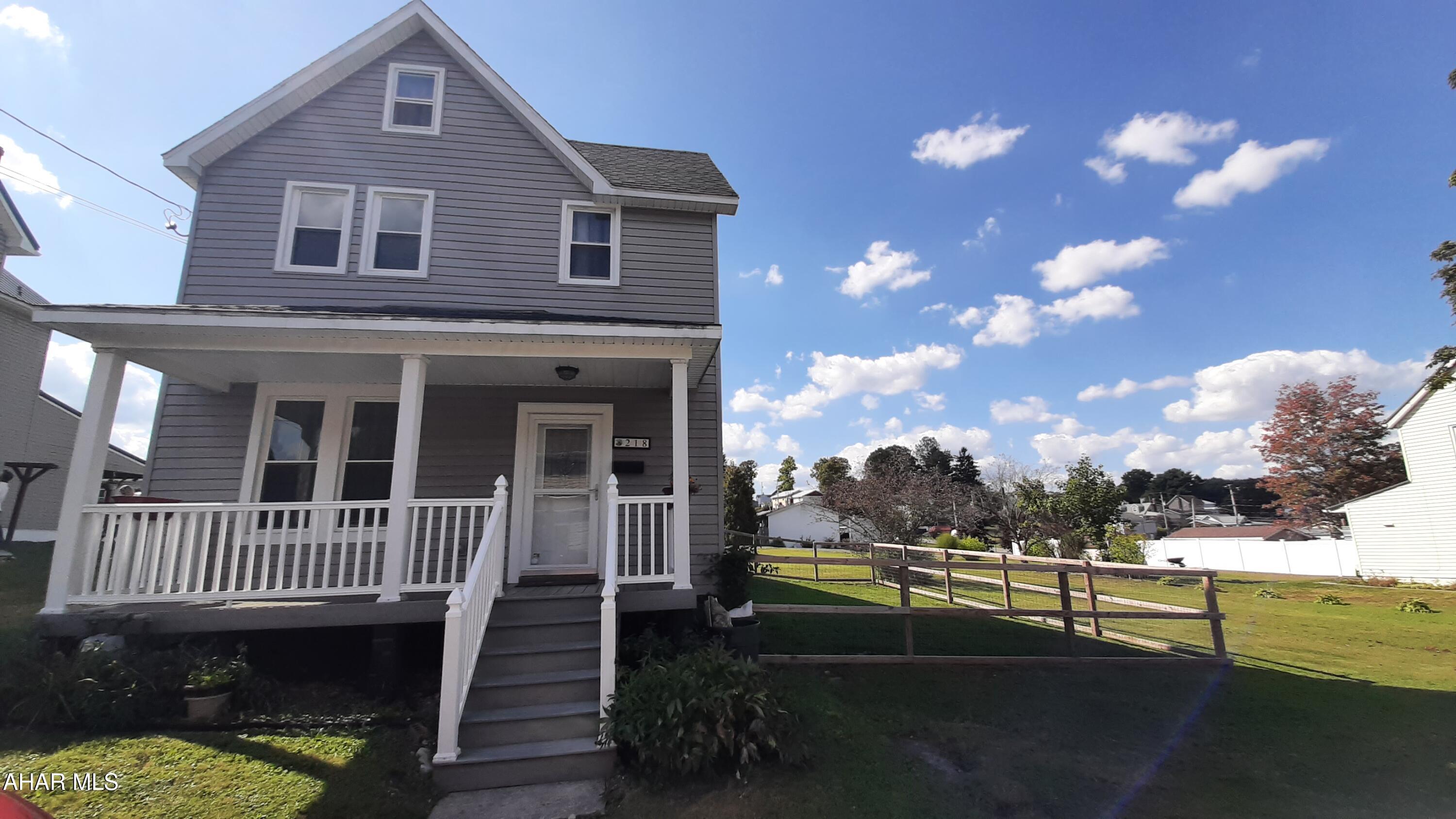 REDUCED PRICE! Step back into time at 218 Spruce Street in Cresson, Sankertown borough! This well built home has mostly all of its original character from the moulding, trim and interior doors. Some of the original windows that were replaced are in the attic. There have been many modern updates that include the kitchen and appliances, an added mudroom, laundry and 3/4 bath. For your furry family members, they have their own entrance and exit into the fenced side yard. The spacious living room and dining room allow for large gatherings. The beautiful staircase leads you to an updated full bath that also has laundry hook ups, and two great sized bedrooms with closet space. The walk up attic could be finished for additional living space. The furnace has been updated along with the hot water tank and roof. The exterior of this home is basically maintenance free. Beautiful covered front porch, back patio to overlook the flat double lot, shed and parking for 4 cars off street. This home has it all and is waiting for you to call today!