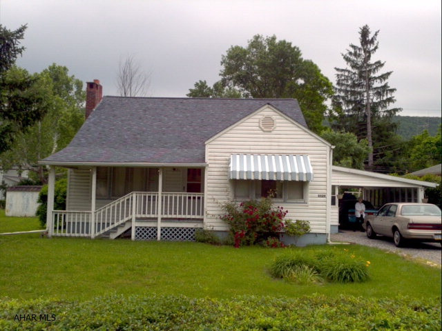 Great location for business or this cape could be a perfect starter or retirement home. Dated but well maintained. This cute residence has loads of potential. Call today for all the details