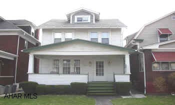 GREAT STARTER HOME WITH LARGE ROOMS.  ENJOY THE ENCLOSED SUN PORCH.  ALL APPLIANCES STAY, NEW WINDOWS AND THIS PROPERTY OFFERS THE CONVENIENCE OF OFF STREET PARKING AND A CARPORT.