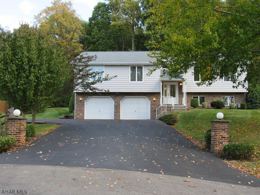 Location!Location!Location!Situated in the highly sought after Bellwood Antis School District,this well maintained over sized bi-level house with a 2 car garage & lighted pillars Welcomes You Home! It's on a semi-private beautifully landscaped .48 acre & surrounded by split-fenced rail & backs up to the woods.Entertaining your family & friends is easy whether rain or shine because of the large deck & the huge enclosed 3 season sun room with an expanse of windows on 3 sides to enjoy the beautifully landscaped backyard.Imagine having your cup of morning coffee on the large deck,sighting deer or wild turkey!The home has a newer roof,furnace,a/c unit & has lots of storage areas.An easy commute from I99 Pinecroft Exit to State College,Huntingdon,Tyrone & Altoona!
