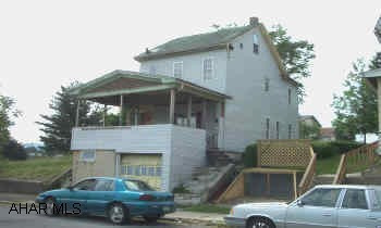 Earn immediate income on this 2 1/2 story in Logantown. Huge lot (125x120) with a nice view of the city, 1st floor laundry. Quick possession.