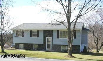 WELL MAINTAINED 3 BR, 2.5BA BI-LEVEL ON A GORGEOUS PRIVATE LOT.  KITCHEN WITH ISLAND AND LARGE EATING AREA.  NEW DECK AND ROOF. STONECRAFT STONE ON FRONT.  ABOVE GROUND POOL WITH DECK.