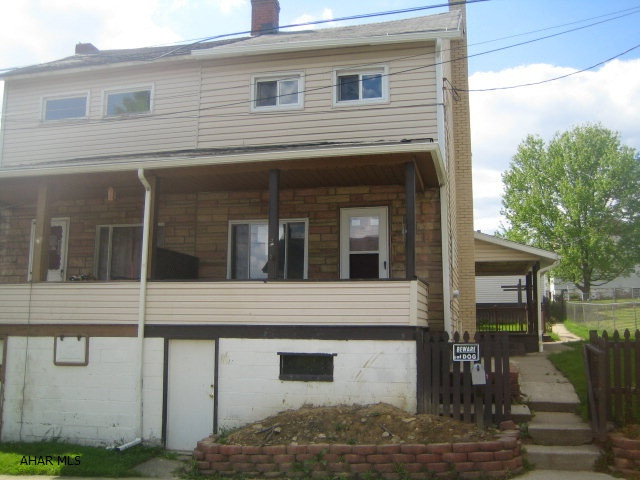 Windber 1/2 vinyl double house. 3 bedrooms, living room, formal dining. Large 2 car garage and shed. Property sold AS-IS. Seller will make no repairs. Offers must be submitted through HUD approved broker. Buyer pays both transfer taxes. Equal Housing Opportunity.