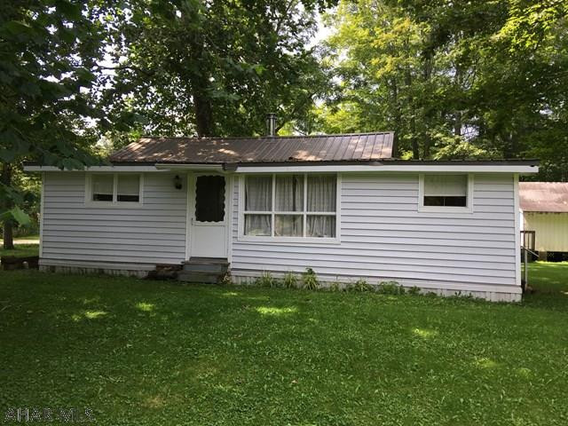 Enjoy the outdoors in this nice 2 bedroom cottage with backyard access to Dunnings Creek!   Perfect for fishing, kayaking and relaxation at its best... Fire pit and brick outdoor fireplace.  Wood burner for heat. Private well and public sewer. Seasonal cottage located off of I 99 and Rt.56.