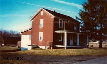 3 bedroom, 2-story frame with outbuildings and full basement.