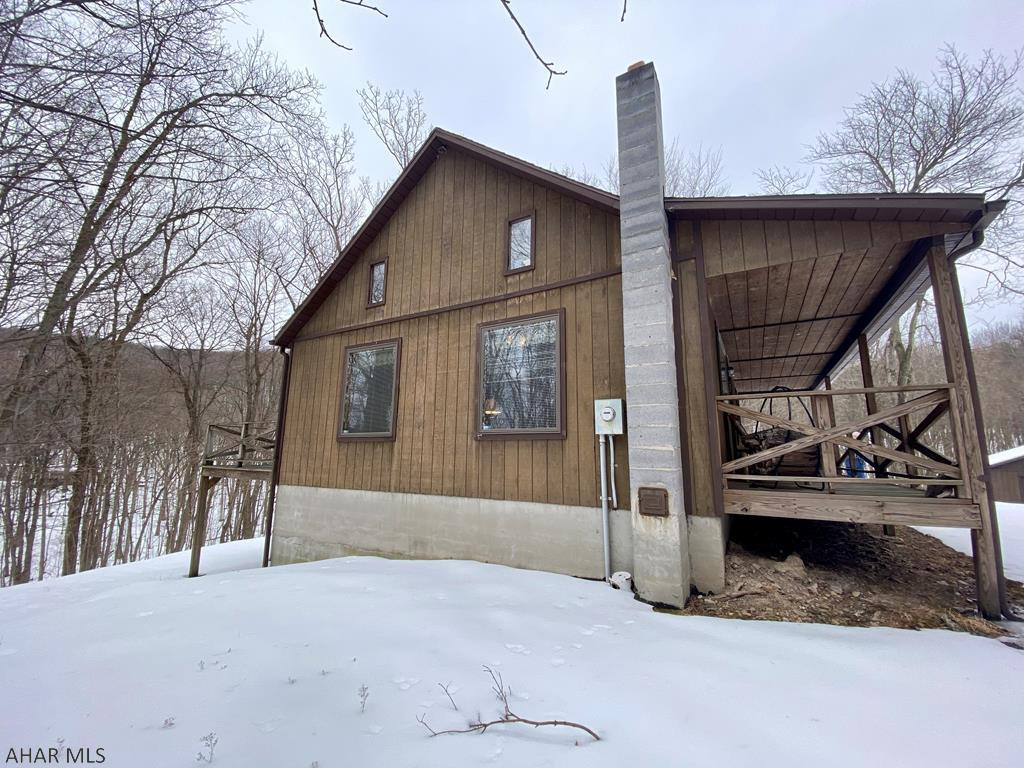 This four-season gated cozy cabin is on a paved road nestled on 45 peaceful wooded acres. The cabin boasts 2 BR,1 BA w/ loft and comes completely furnished. Full unfinished walkout basement with lots of potential. There is a detached two-car garage that houses a pristine 1992 stingray boat for sale. If you don't have a boat of your own, that will come in handy--only 2.5 miles from Shy Beaver Boat launch. This cabin has been meticulously cared for over the years with attention to detail. Electric and phone utilities are underground. Stay warm in the winter with the wood burning stove on brick hearth. Electric has been roughed in for central air and provisions were made in the construction for addition of great room. Additional hand dug and drilled well on property. It's lake time, call now!