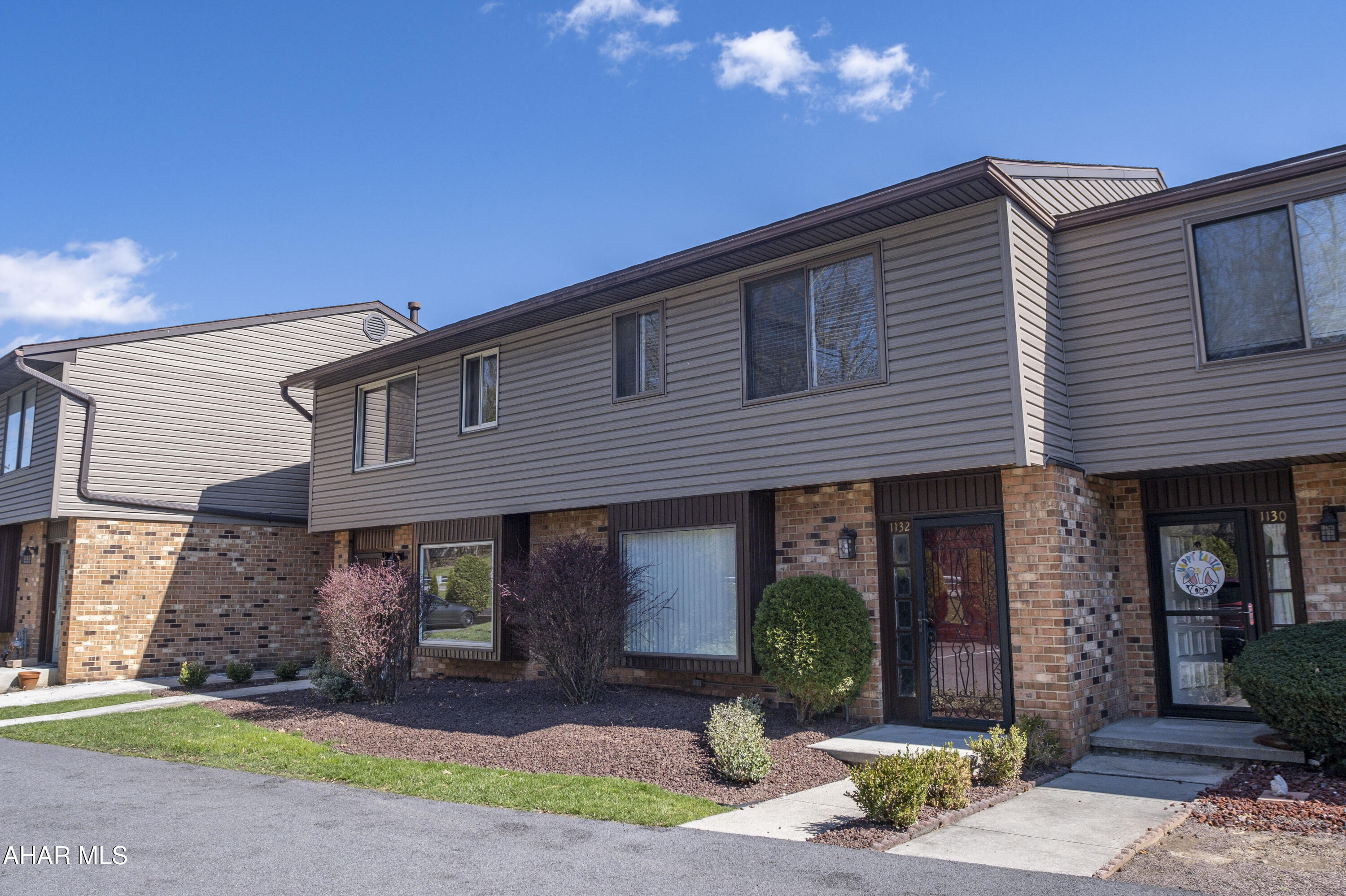 Easy-breezy low-maintenance living, nestled in the sought-after Hollidaysburg Area School District, 1132 Fairway Townhouse Lane blends convenience, comfort, and easy living that you have been searching for. 

This townhome features 3 bedrooms, 2.5 bathrooms, a spacious primary bedroom with attached primary bathroom, kitchen with large sitting bay window flowing into a large dining room that is open to the living room creating that open-concept living space feeling. The living room has a sliding glass door that leads to the huge extended & covered outdoor deck with plenty of room for your patio furniture - ideal for relaxing or entertaining, rain or shine. The attached garage provides secure parking and storage, leading into a finished basement with family room and laundry room. The HOA is $165/month and makes upkeep a breeze.

Perfectly positioned within close proximity to the Blair Regional YMCA, Hollidaysburg schools, Sylvan Hills Golf Course, Blairmont Country Club and downtown Hollidaysburg, this property combines modern convenience with easy-breezy living - all that's left to do is move in! Schedule your showing today!