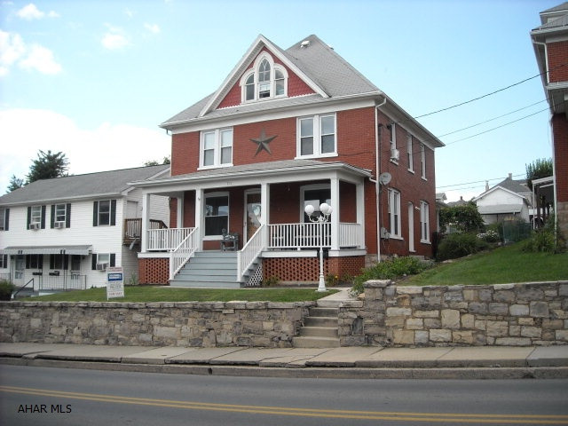 Absolutely beautiful!  Former parsonage in Roaring Spring.  Nicely updated from the studs out!  Open floor plan, maple cabinets, insulated, good roof.  1 car detached garage, beautiful hardwood floors. Landscaped lot with new patio equipped with a firepit.  3rd floor can be finished for a large 4th bedroom.  Oil hot water heat (600 gal/yr approx usage), new windows, 200 amp elect,50 gallon electric hot water tank, all brick plus more!