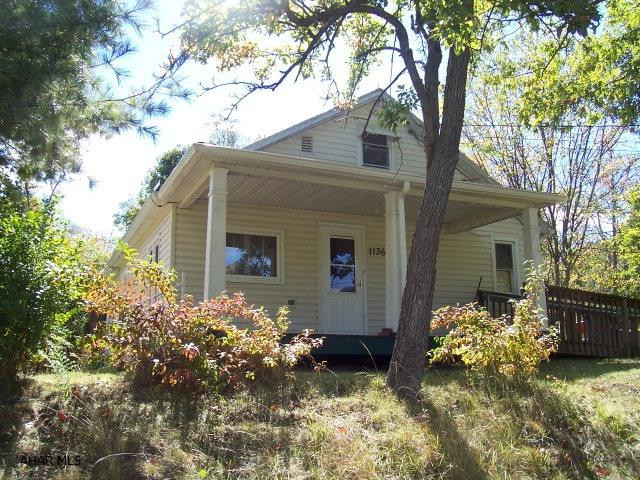 This nice starter home would be ideal for a great hunting camp retreat. Features 28x14 1 car garage/workshop. Updated in 2009 with new windows, electric, bath, doors, siding and a 2003 furnace.