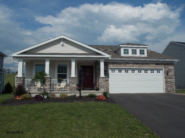 Seller paid attention to detail in this cottage style home with tons of upgrades. Step into the foyer and notice the wide open floor plan and wide hall. The stunning kitchen with granite, ceramic floors and vaulted ceilings opens to the eating area and the great room. The finished basement adds so much extra space, and paver patio and covered deck are great for entertaining. Call today to see all this home has to offer.  Easy living- all on one floor.