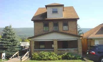Remoseled 2 1/2 story brick. Many added features. Quality throughout. Must see!!!