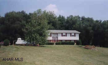 BEAUTIFUL ONE ACRE LOT ON CUL-SE-SAC. ELECTRIC UNDERGROUND DOG FENCE. COVERED DECK. LANDSCAPING. FENCED GARDEN AREA. PARTIALLY FINISHED BASEMENT. PLUMBED FOR BATH. LARGE SHED WITH ELEC. KITCHEN WITH DINING AREA & BREAKFAST BAR.