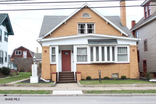 This brick beauty is a must see! This home has 3 bedrooms (25x15, 16x10, 14x9 )w/walk ins for extra storage. The hardwood floors have all been refinished and the home has recently been repainted throughout. The main floor has an open feel w/large living room (28x15) w/ brick fireplace, dining room, den and adjoining 3/4 bathroom.  Den could be 4th bedroom. The detached over sized garage offers plenty of storage w/ additional parking.  Great opportunity!