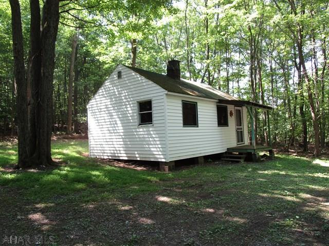 Rare opportunity to have a secluded cabin in Buchanan State Forest.  Enjoy hunting, ATV/snowmobile use and hiking.  Good hunting area for deer, bear or turkey.  Field within 50 yards containing apple trees.  Camp is located directly across from the approved "Martin Hill ATV & Snowmobile Trail" system.  DCNR ATV & snowmobile trails are open during approved seasons.  Includes 10'x12' shed & Privy.  No water or electric service but has propane heater & lanterns.  Lease holder must be a Pennsylvania resident over the age of 18.  A person may only hold one DCNR camp lease.  Cannot be used as permanent residence or for business/commercial activity.  This is a (cabin only) sale.  The lease must be secured separately with the Commonwealth of PA.  Other restrictions apply.