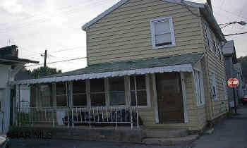 REALLY CUTE! 2 BEDROOM WITH HARDWOOD FLOORS. NEW CARPET, 1ST FLOOR LAUNDRY & SUNROOM. GREAT STARTER OR INVESTMENT IN TYRONE BORO. SIDED AND NEW WINDOWS. EFFICIENT. SOME REMODELING DONE, SOME NEEDED. "AS IS". CALL DARLA 696-1227 OR 934-4663.