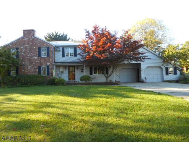 This  spacious 4 bedrm, 2.5 bath  home is located on a large corner lot in the original section of Penn Farm Estates. First floor family rm w/stone fireplace, bonus rm with lots of natural sunlight. Kitchen with eat-in area, formal dining rm and living rm w/fireplace. 2nd floor has 4 bedrms and 2 bathrms. Hardwood  floors throughout. 2 car attached garage. Covered deck off  bonus rm. Several rms have electric storage units.