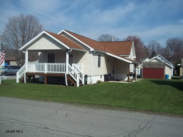 Motivated Seller. 1 story-2 bedroom 1 bath home on corner lot with C/A, over sized 1 car garage with garage door opener, large barn style shed, 3 car off street parking and large front covered deck.Possible small third bedroom. New Hot water tank. 3% sellers concession  with full price offer. Property does not require flood insurance.