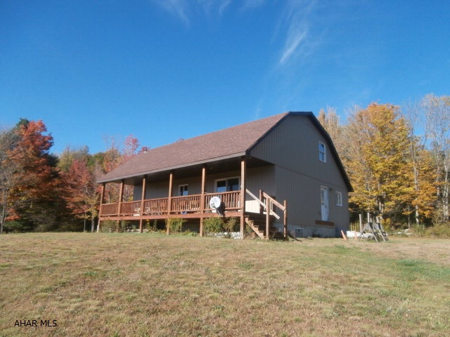 Secluded hunting camp or summer home with million dollar view. Great get away! Camp has open layout with kitchen great room combo. Second floor could be additional bedrooms. Full basement great for storage. 134 acres of great hunting with deer, turkey, ect. with good ground cover. Generator for electric.