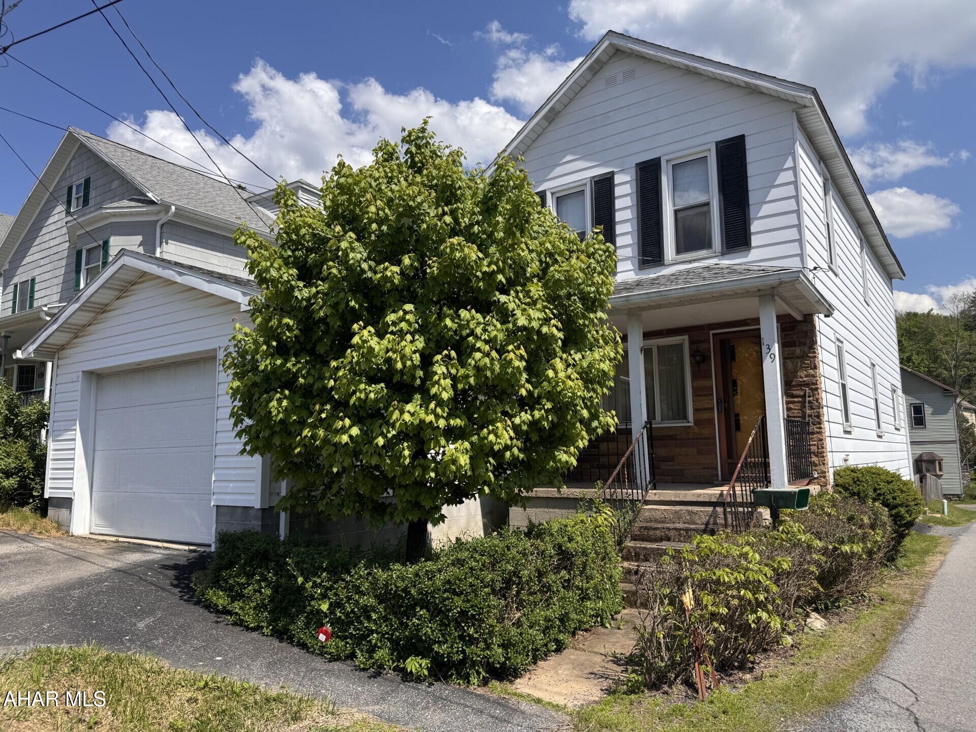 2 story 2 Bedroom, 1 3/4 bath home on level corner lot.  Eat-in kitchen, LR, DR, and 3/4 bath on first floor.  2 BR's and full bath on second floor.  New furnace in December, 2025.  Mini Split.  1 Car Attached garage & older storage garage at the rear of property.  Side porch with ADA ramp for easy access.  Priced to sell!