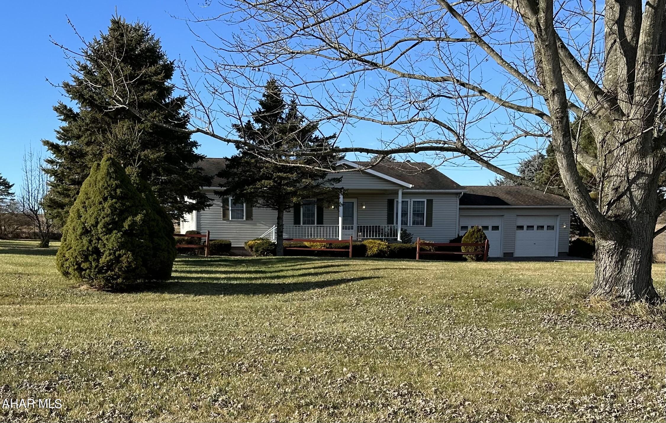 This spacious move in ready ranch home on .6 +/- acres is conveniently located between the Bedford Interchange and the Cessna Exit off of I99.  The front deck offers lovely views of the countryside while the home's spacious design offers plenty of room for family entertainment and enjoyment.  The master bedroom has an en-suite bathroom while two additional bedrooms share another bathroom.  Enjoy the abundance of cabinet and counter space in the large kitchen which opens onto the bright and airy dining area. A laundry/ mud room is conveniently located next to the kitchen and back entrance of this home.  The oversized attached 2 car garage allows easy access to the kitchen and provides ample storage and a work bench.