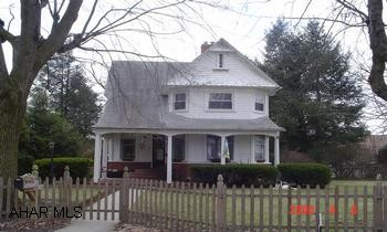 A Classic Bellwood Beauty!  This stately home sits on almost a half an acre in the Borough with mature trees shading both porches.  A riverstone patio in the backyard is ready for summertime cookouts. This great home will not last long! The home is set back on the lot giving ample privacy in a suburban setting.  You will be within walking distance to all of Bellwood's amenities and schools.  Improvements since current ownership include hot water heater, garbage disposal, kitchen counter tops, flooring in 1/2 bath, riverstone patio and natural picket fence with three gates.