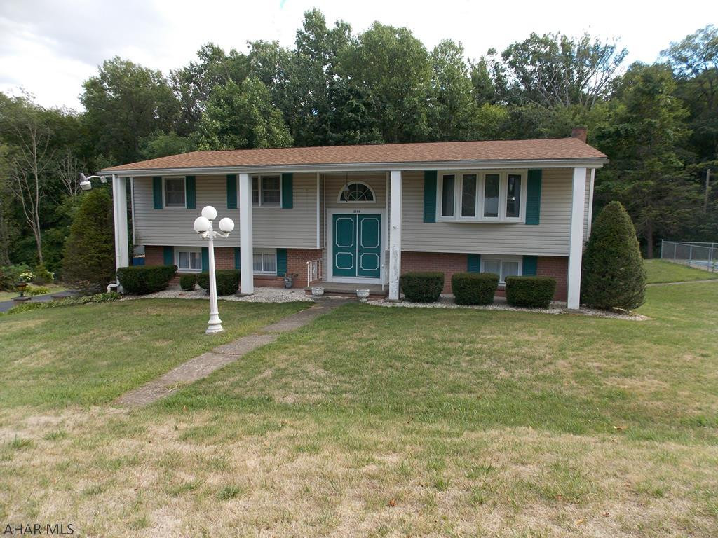 Great home in Juniata Gap! Spacious living room and a formal dinning room! Master bedroom has a walk-in closet and both additional bedrooms have plenty of closet space. Family room in the lower level is great for entertaining. Huge bonus room in the lower level would make a great 4th bedroom. Finished lower level could very easily be used as a mother-in law suite! Enjoy a summer evening in the lovely sunroom!  Plenty of parking and a large 2 car garage. Home sits on 1.06 Acres with a peaceful stream running behind the home. You will love the inground pool in the summer months!