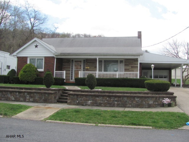 Great brick and stone rancher in Saxton. Home has been well maintained. Large den has many possibilities. Enclosed three seasons room. Attached garage and carport. This home is priced to sell and will not last long.