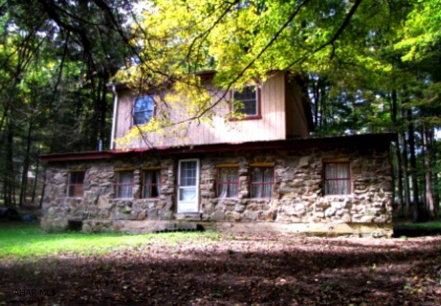Perfect Hunting Camp! Has 4 bedrooms, 2 on first floor and 2 on second floor. Renowned trout stream of Penns Creek in Centre County. Creek is a few hundred feet from the house! Great view of Creek! Wooded lot! Property has an Outhouse. Property has wood and oil heat. No water. Very private and secluded. Beautiful, picturesque view of the stream.