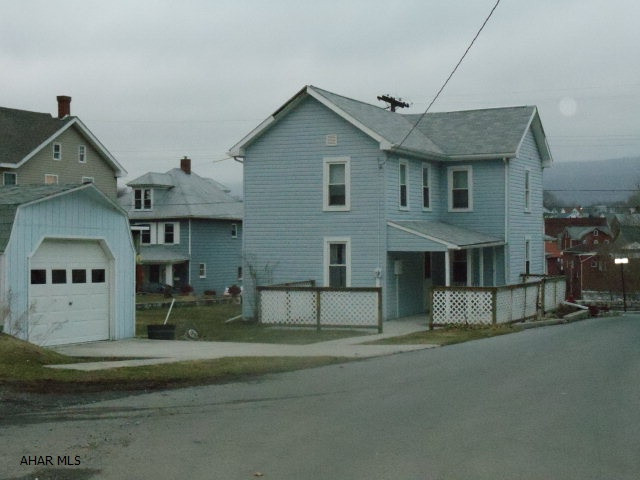 Nice 3-bedroom, with 10 year-old vinyl siding, windows, roof, front porch & furnace.  Double long, single width garage.  #J-045