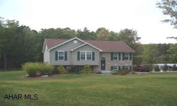 4 year old brick & vinyl bi-level on 1.46 acres in Warriors Mar. 3 BR, 1 3/4 BA, open floor plan, 2x6 walls throughout, pavillion area, organic landscaping, surrounded by woods. Please do not let cat out & leave dog in cage.