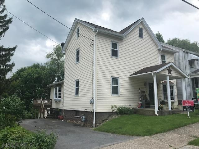 One buyer's loss is another's gain and we have majorly reduced the price for a quick sale.  Totally updated vinyl sided home with newer windows.  Terrific eat-in oak kitchen with ceramic tile floors & laundry has plenty of room for all your family gatherings.  Patio door to large deck with retractable awning has yard access.  Spacious modern bath on 2nd floor.  Nice size bedrooms.  Off street parking.
