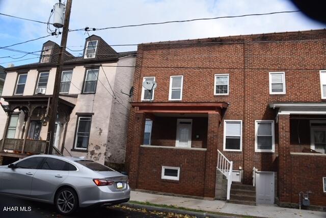 Remodeled townhouse with hardwood floors in living room and dining room,  ceramic tile in kitchen, new carpeting in spacious bedrooms.   First floor half bath.  New composite decking on front porch.  Short walk to the Diamond in Hollidaysburg for all borough activities.   Fenced yard.  Move right in.  No work to be done.