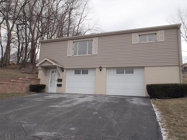 Immaculate Highland Park area 2 bedroom home with beautiful hardwood floors throughout. Absolutely beautiful view of the mountains from the large living room window.  Original owner of this custom built home. New furnace in 2015, central air, and beautiful landscaping in 2016 .Large 2 car garage with lots of storage. Lower level laundry area with washer & dryer included and also  a bath in the lower level with  a newer shower. This home has been kept in pristine condition. Enjoy the covered back patio with beautiful landscaping. All you have to do is move in.
