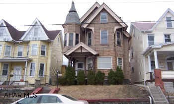 Sold AS-IS. This is a 2-sty duplex and a single family home.