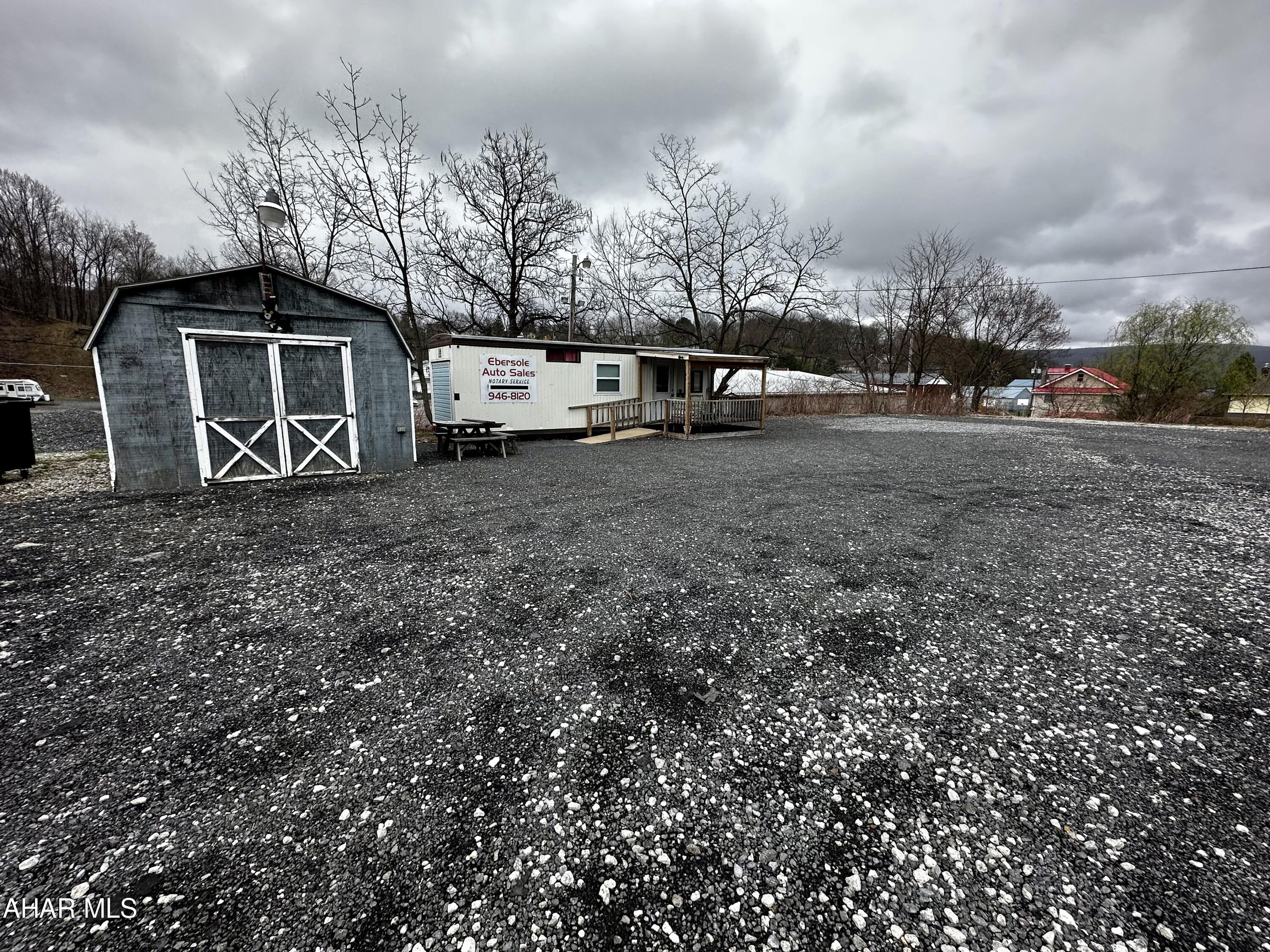 Located on Route 36, this former car lot offers endless possibilities! Great flat location for storage units or keep it as a car lot. High traffic area with so much potential!