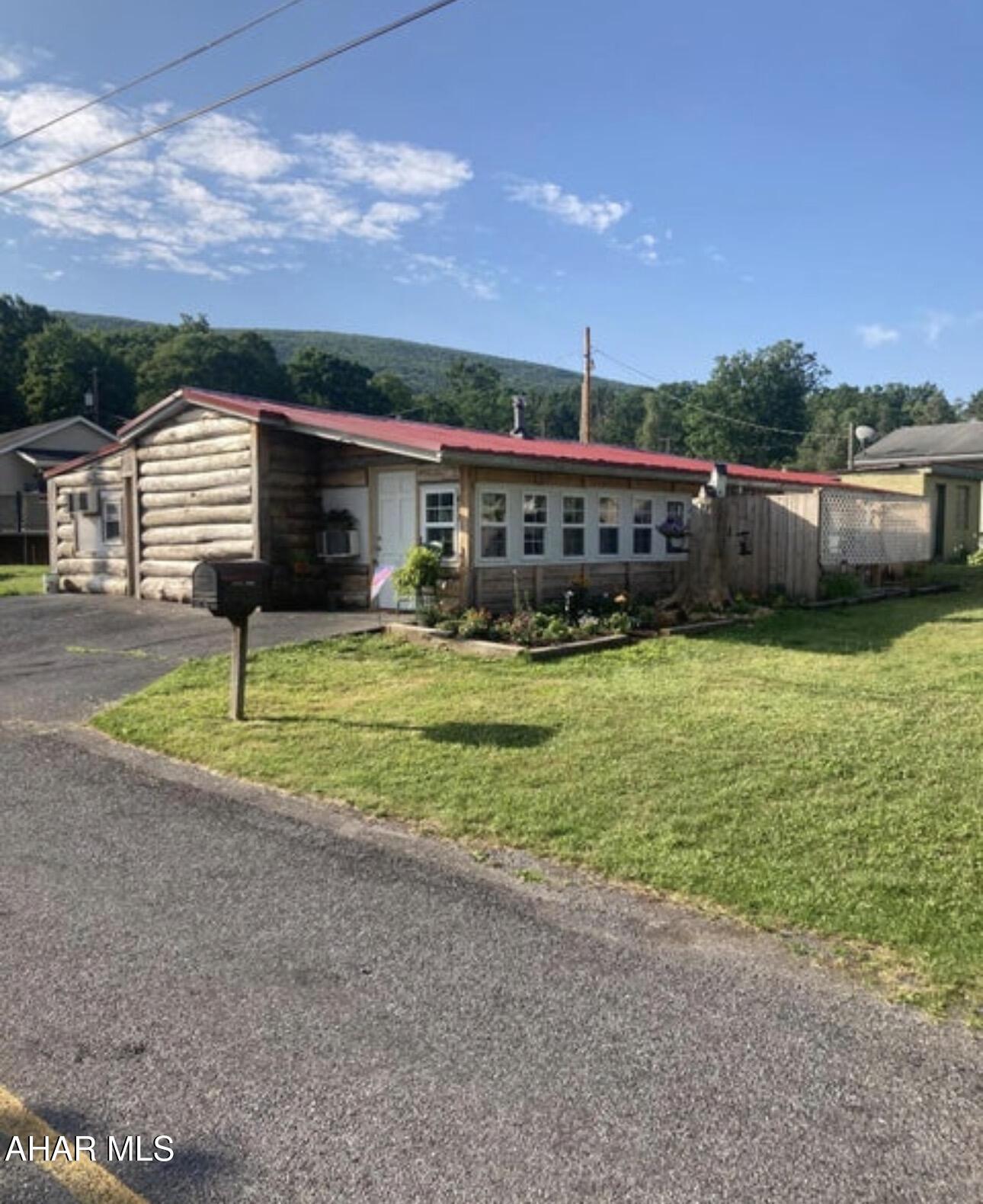 Check out this fully occupied duplex in the beautiful Greenwood area of Altoona! One side is an efficiency and the other is a two bedroom. Both have private outdoor areas. 

The property spans three lots with a large, flat yard and include a shed and pump house for the well.