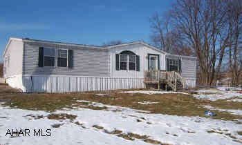 3 bedroom 2 bath doublewide with small barn.  From Hollidaysburg Rt 22 towards Huntingdon turn right onto Shaffersville Road at light.  Turn onto Hungry Hollow Road to Hidden Valley Lane.  Right to Rasberry Run Rd. sold "as is"  See listing agent  for addendum.  All offers must be accompanied by a pre-qualification letter or proof of funds.