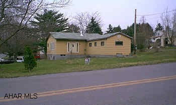 One story Logan Township.  Handyman special on approx, 1/2 acre shingle roof 8 yrs - LR, Kit, DR, 2 BR, 1 BA.  Pull down steps to storage.  Lot 141 x 141 Irr.