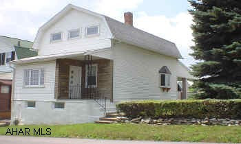 Very nicely-kept 2 story on a double corner lot. Newer roof, windows, & siding, 2 car detached garage. Pleasant Valley Elementary School. Beautiful view of the mountains off I-99. Well worth the asking price. Call Hank.