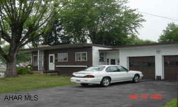 1 story, 2 bedroom, 2 bath home on large 125x120 lot in Garden Heights area. 2 car garage. Hardwood floors under carpet in living room & bedroom. Working well in back yard.