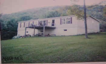 Beautiful immaculate doublewide on 10 very secluded acres trout stream and is adjacent to state game lands