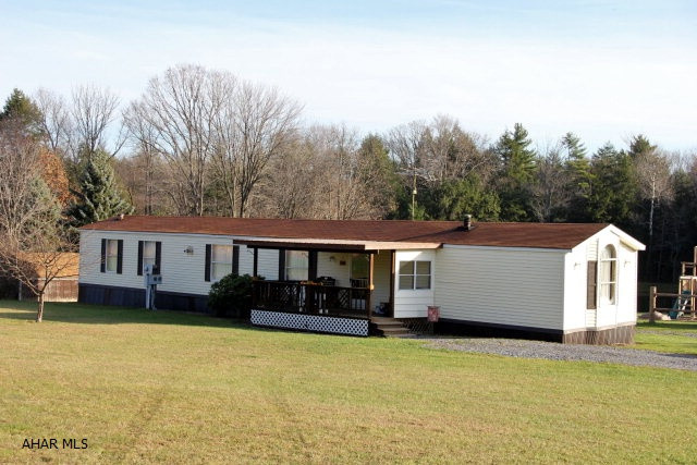 Attractive, well maintained mobile Home on 5 beautiful acres w/ pond. 2-3 BR's, 2 baths. Appliances included. Central air & shed