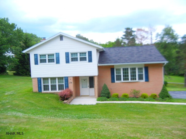 Location, Location, Location!!!!  This split level awaits new owner (one owner to date,,, very well maintained)  Offers 3 BR, 1 1/2 BA, very spacious family room with fireplace, large kitchen with breakfast bar and separate dining area to host holiday dinners! Have barbeques on the rear deck (glass sliding patio doors in dining room lead to deck)  This home sits on a large lot (.61 acre) Also has a one car garage.  Very nice  hardwood floors are hiding under carpets:) but are exposed in the one bedroom.